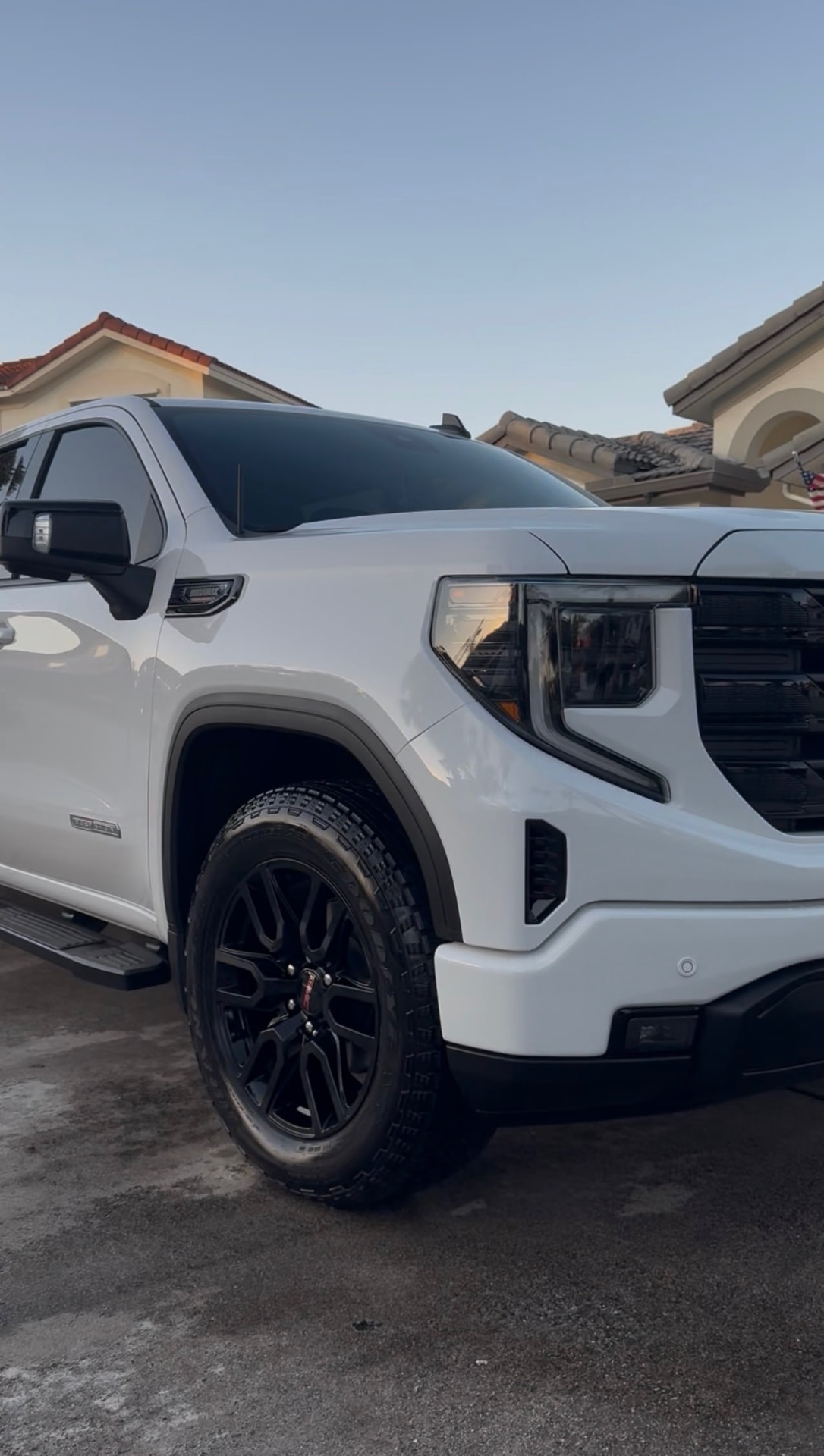 White pickup front wheel and headlight, dressed and glossy